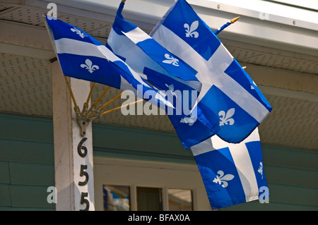 Quebec's flags on a house St Jean sur Richelieu Stock Photo