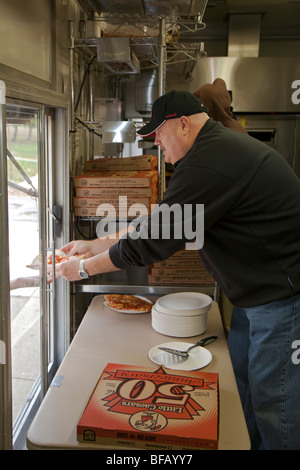 Little Caesar's pizza chain serves pizza to needy Detroit residents Stock Photo