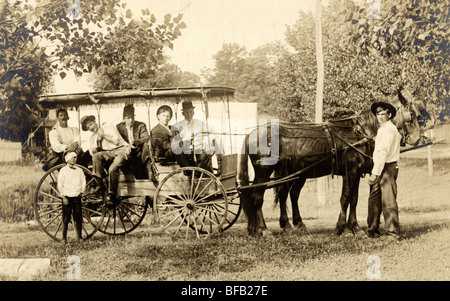 Group of Five Men in Horse Drawn Carriage on Outing Stock Photo