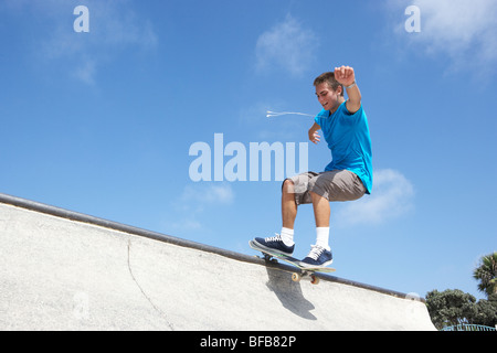 Teenage Boy In Skateboard Park Stock Photo