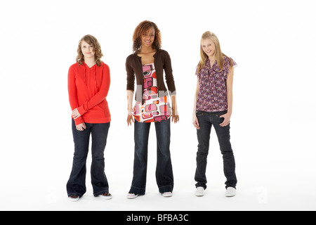 Full Length Portrait Of Three Teenage Girls Stock Photo