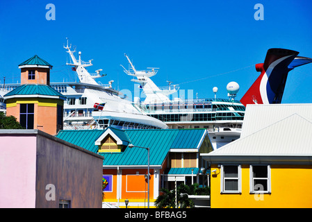 Cruise ships behind buildings in Nassau Bahamas Stock Photo