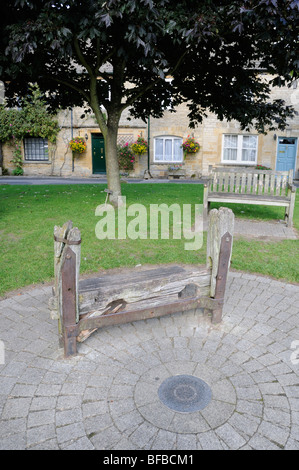 The village stocks, Stow-on-the-wold, Gloucestershire, cotswolds, UK, September Stock Photo