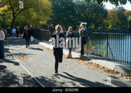 Joggers share the path around the reservoir in Central Park on Sunday, October 25, 2009. (© Richard B. Levine) Stock Photo