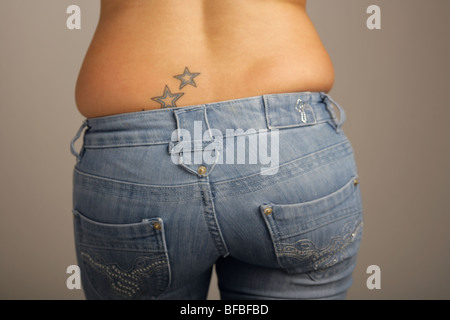 view of a womans bottom in jeans with  no top Stock Photo