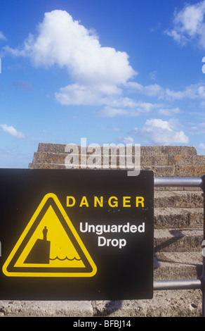 Rocky jetty with danger sign on Lake Michigan Stock Photo - Alamy