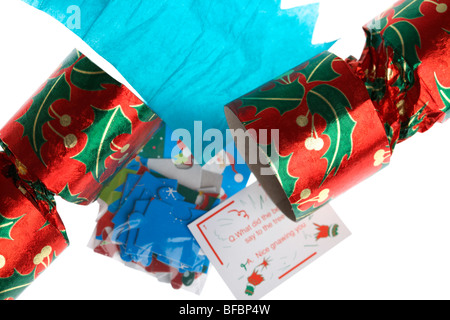 broken open christmas cracker with hat joke and novelty item usually used at christmas Stock Photo