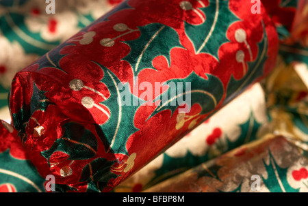 close up of pile of christmas crackers Stock Photo