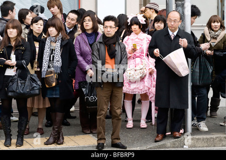 Portrait of a young person in fancy dress walking through the crowds in Harajuku, Tokyo, Japan Stock Photo