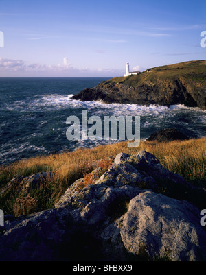 Stinking Cove and the lighthouse at Trevose Head viewed from Dinas Head on the North Cornwall coast near Padstow, Cornwall, England. Stock Photo