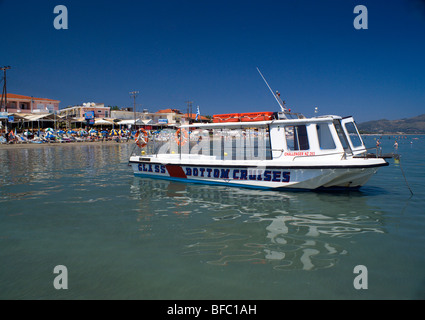 tourist glas bottom boat moored off laganas beach zakynthos / zante greece Stock Photo