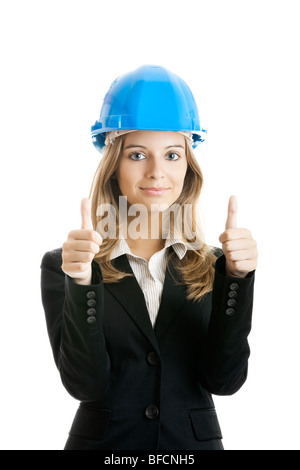 Beautiful female architect with thumbs up isolated on white Stock Photo