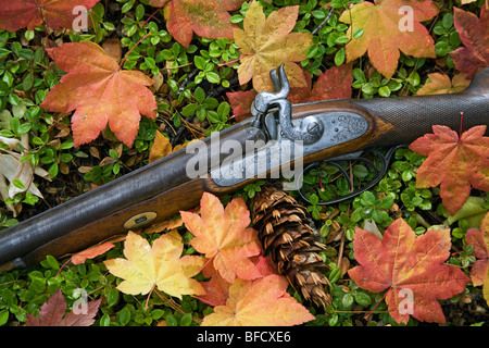 An 1860 double barreled antique muzzle loading 17 gauge shotgun with damascus barrels Stock Photo