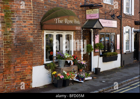 flower display in front of a florist shop High Street Cookham Berkshire UK Stock Photo