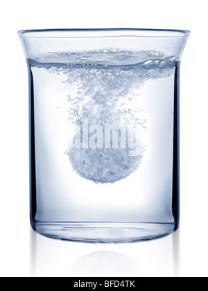 fizzy pill is in glass of water Stock Photo