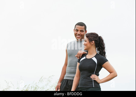 Young man and woman smiling after running on gravel trail at Spirit Mound, South Dakota. Stock Photo