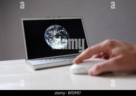 Earth on computer screen Stock Photo