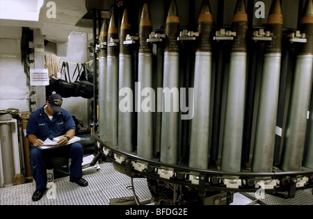 US Navy Sailor studying Stock Photo