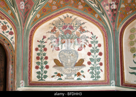 Amber Palaces in Amber Fort are decorated in a style which is a unique fusion of Mughal and Rajput architecture and design. The Stock Photo