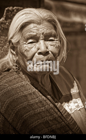 Elderly woman in front of church at Atotonilco, Guanajuato, Mexico. Stock Photo