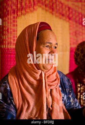 MOROCCO - Berber woman at women's argan oil cooperative in Atlas mountains. Stock Photo