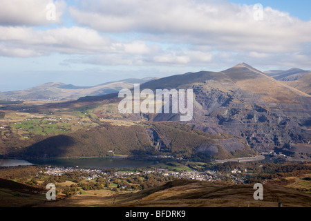 View above village below Elidir Fawr mountain and old disused Dinorwig slate quarry. Llanberis Gwynedd North Wales UK Britain. Stock Photo