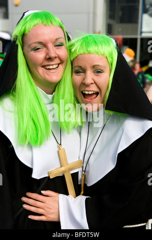 Visitors getting into the party spirit at the St Patrick's Day Parade in Digbeth Birmingham, England, UK Stock Photo