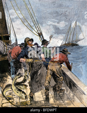 Cod fishermen hauling in hand-lines from the deck of a boat on the North Atlantic, 1800s. Hand-colored woodcut Stock Photo