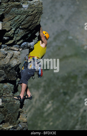 A climber leading a climb at Grand Sentinel, Lake Louise, Banff National Park, Alberta, Canada Stock Photo