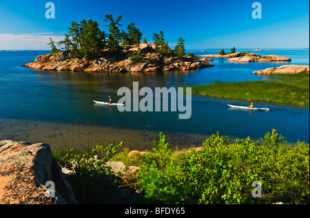 Kayaking on Chikinishing River at the mouth of Georgian Bay, Killarney Provincial Park, Ontario, Canada Stock Photo