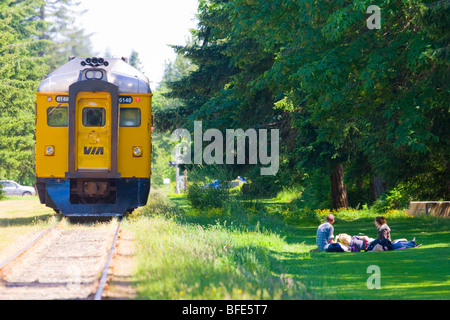 Via Rail train service entering the Qualicum Beach train station, Qualicum Beach, Vancouver Island, British Columbia, Canada Stock Photo