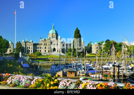Flowerbed and Inner Harbour with Parliament buildings, Victoria, Vancouver Island, British Columbia, Canada Stock Photo