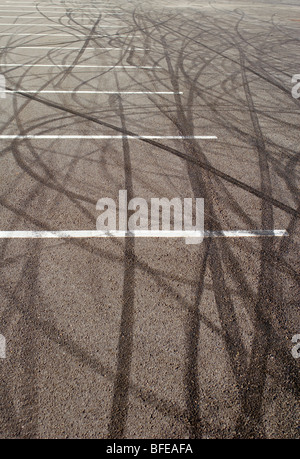 Skid marks on tarmac in a car park at Black Rock, Brighton, England. Stock Photo
