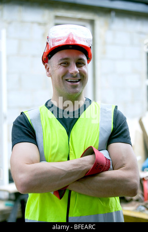 Portrait of a builder with hard hat Stock Photo