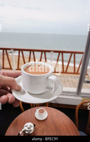 Afternoon tea at the Wish Tower restaurant on Eastbourne seafront, UK. Picture by Jim Holden. Stock Photo