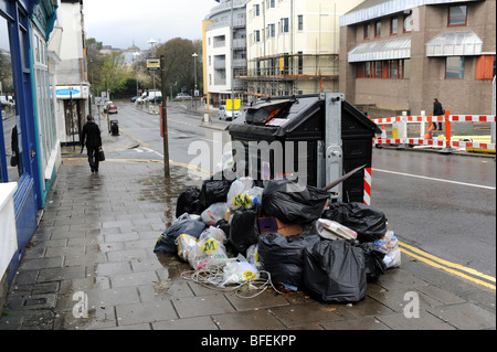 Piles of rubbish building up on the streets of Brighton during a strike by city council Stock Photo