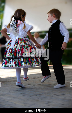 Young Svab children in traditional dress dancing at the wine harvest festival , Hajos (Haj s) Hungary Stock Photo