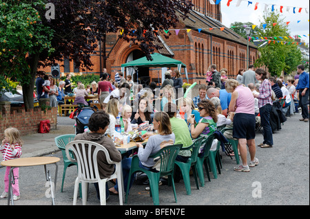 Communal dining in the street, St Margarets, London, as part of the Eden Project initiative. Stock Photo