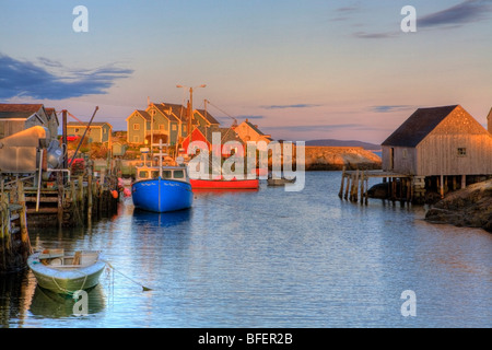 Sunset over fishing village, Peggy's Cove, Nova Scotia, Canada Stock Photo