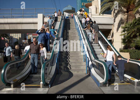 People walk on the street - escalator - Las Vegas Stock Photo
