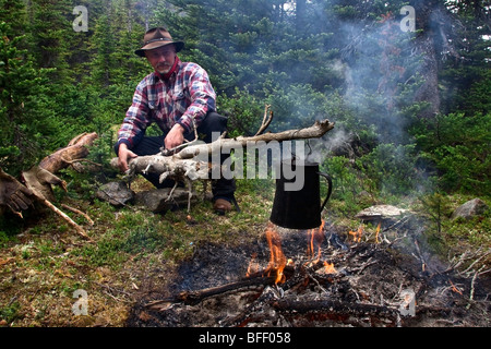 Camp fire on a trail ride through the Itcha Mountains in British Columbia Canada Stock Photo