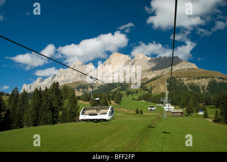 Chairlift up to Rifugio Paolina in the Catinaccio range of the Dolomite Mountains of Northern Italy. Stock Photo