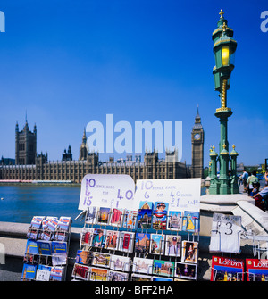Postcards for sale at Westminster bridge and Westminster Palace with Big Ben clock tower London Great Britain Stock Photo