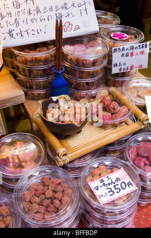Umeboshi [sour plums] on sale at a stall in Japan Stock Photo