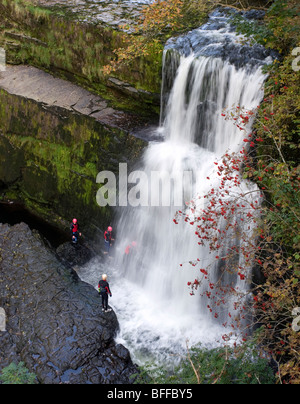 Sgwd Clun-gwyn waterfall near Pontneddfechan in the Brecon Beacons National Park at autumn, Wales. Stock Photo