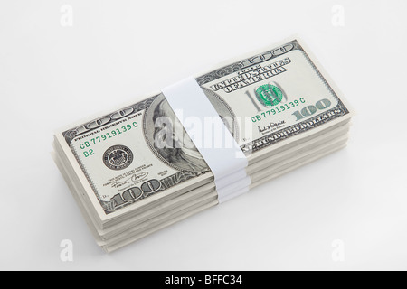 Cutout of a pile of US bank notes on white background Stock Photo