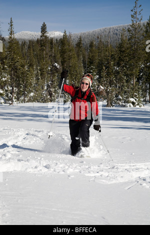 A snow shoer in deep snow near Mount Bachelor in the Oregon Cascade Mountains in winter. Stock Photo
