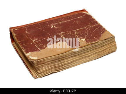 old damaged battered book on white background Stock Photo