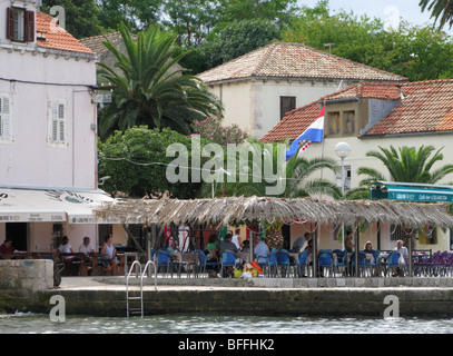 Beach Bar cafe Kolocep Croatia harbourside Stock Photo