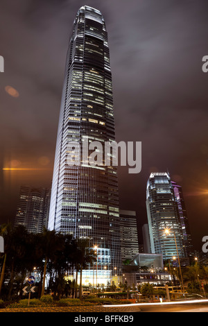 An atmospheric night view of Hong Kong's Two International Finance Centre's (2 IFC) illuminated office tower. Stock Photo